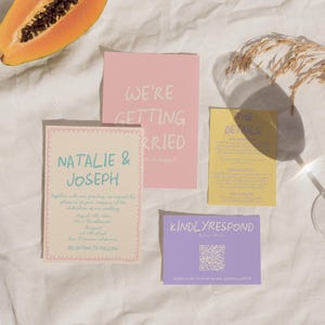 May include: A collection of wedding stationery, including invitations and RSVP cards, in pastel colors. The invitation cards feature the names "Natalie & Joseph" and the phrase "We're Getting Married". A QR code is visible on one card.