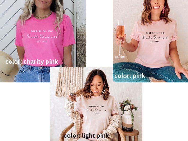 May include: Three different color variations of a pink t-shirt with the text "MINDING MY OWN Small Business EST 2023" printed on the front. The colors are charity pink, pink, and light pink.