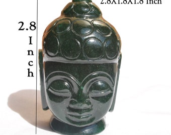 May include: A dark green stone Buddha head sculpture with a smooth, polished finish and carved hair details. The sculpture measures 2.8 inches in height and 1.8 inches in width, as indicated by the text labels printed on the image.