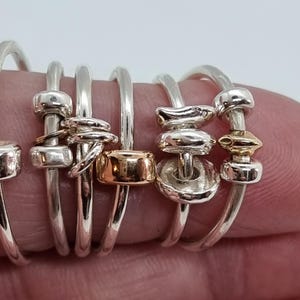 Handgemaakte sterlingzilver 925 en 9 kt gouden Anxiety Fidget Rings. Stapelbaar.