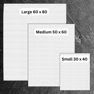 May include: Three white paper sheets with black text on a dark grey background. The text on the sheets reads "Large 60 x 80", "Medium 50 x 60", and "Small 30 x 40".
