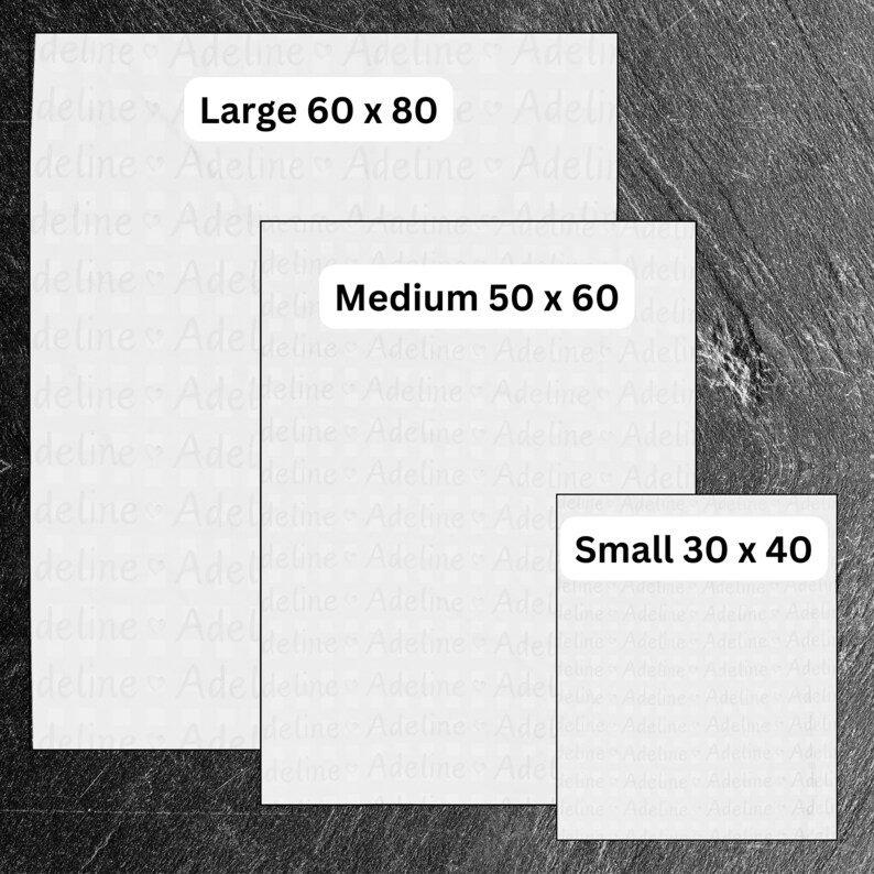 May include: Three white paper sheets with black text on a dark grey background. The text on the sheets reads "Large 60 x 80", "Medium 50 x 60", and "Small 30 x 40".
