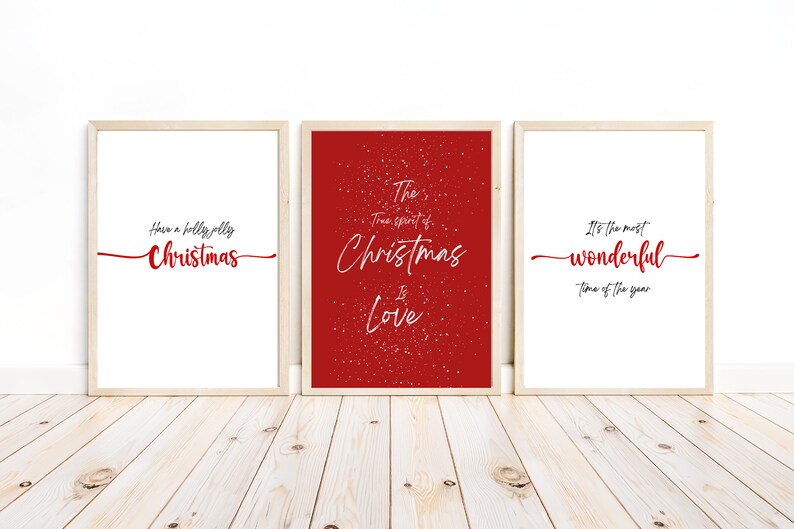 May include: Three framed prints with red text on a white background. The first print says "Have a holly jolly Christmas". The second print says "The true spirit of Christmas is Love". The third print says "It's the most wonderful time of the year".