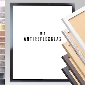 May include: A black picture frame with a white background and the text "MIT ANTIREFLEXGLAS". The frame is shown with other frames in different colors and styles.