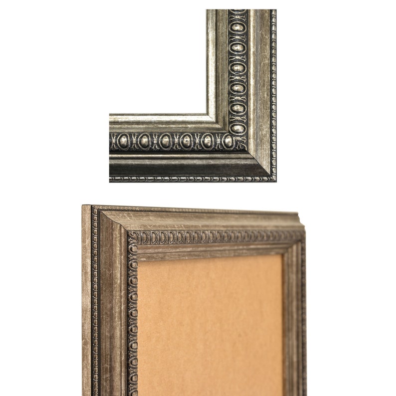 May include: A silver picture frame with a decorative border and a brown mat. The frame is made of wood and has a distressed finish.