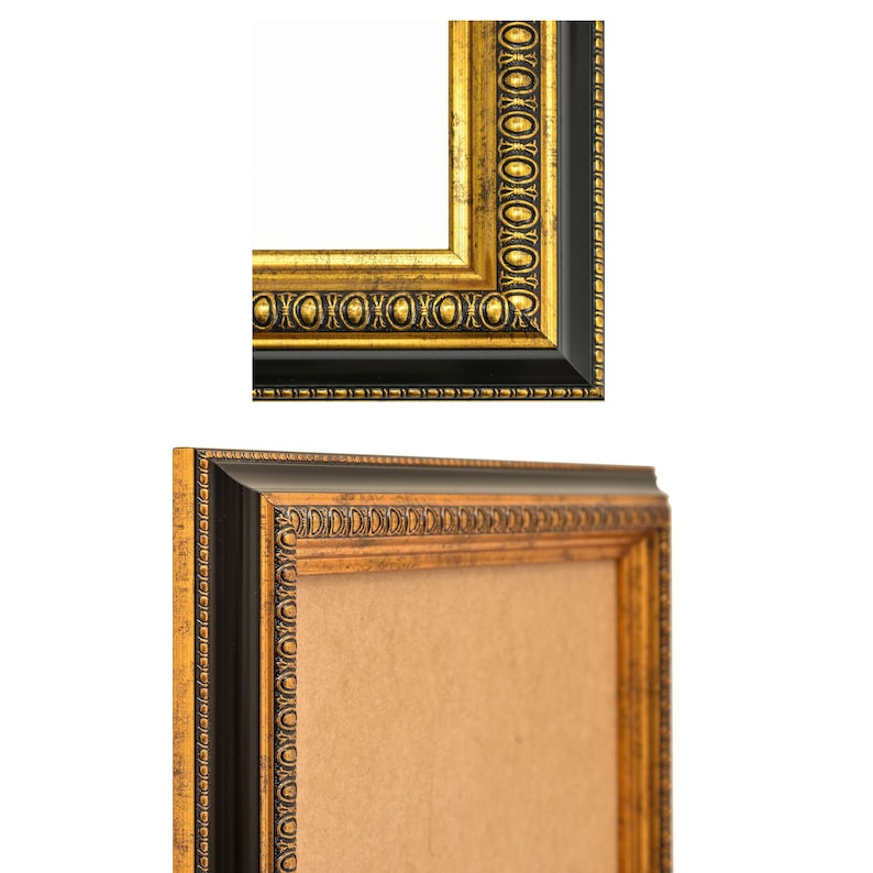 May include: A black and gold picture frame with a decorative border. The frame has a brown cardboard backing.
