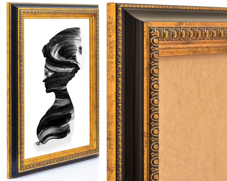 May include: A gold picture frame with a black inner border and a decorative pattern. The frame is empty and ready to display a photo or artwork.