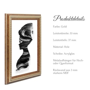 May include: A gold-colored wood frame with a black and white abstract art print. The frame has a 2.1 inch wide molding and a 1.5 inch deep molding. The frame includes a clear acrylic sheet and a metal hanger for hanging in portrait or landscape orientation. The back of the frame is made of 3 mm thick MDF.