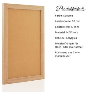 May include: A wood picture frame with a cork backing. The frame is 30 inches wide and 17 inches deep. The frame is made of MDF wood and has a Sonoma finish. The frame includes a clear acrylic sheet and metal hangers for hanging in portrait or landscape orientation. The back of the frame is made of 3 mm thick MDF.