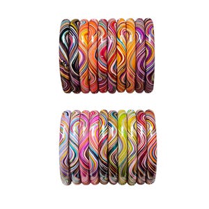 May include: A collection of eighteen circular bangles arranged in two rows. Each bangle features a distinct swirling, marbled pattern with vibrant, multi-colored lines in shades of orange, pink, purple, yellow, green, black, and white.