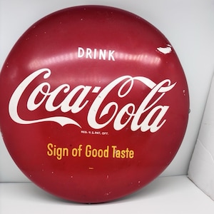 May include: A set of three ceramic mugs with a speckled, matte finish. The mugs are in shades of cream, light gray, and dark gray. Each mug has a simple, minimalist design and a rounded handle.