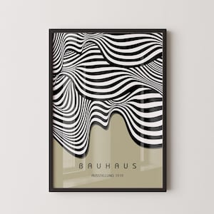 May include: A black and white striped abstract design poster with the text "BAUHAUS AUSSTELLUNG 1919" on a light brown background.