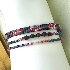 May include: A handmade wooden chopping board with a natural finish and a live edge. The board is rectangular, measuring approximately 45 cm long and 30 cm wide.