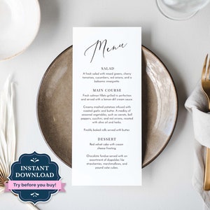 May include: A printable wedding menu template with a minimalist design. The menu features a salad, main course, and dessert. The text is in black font on a white background.