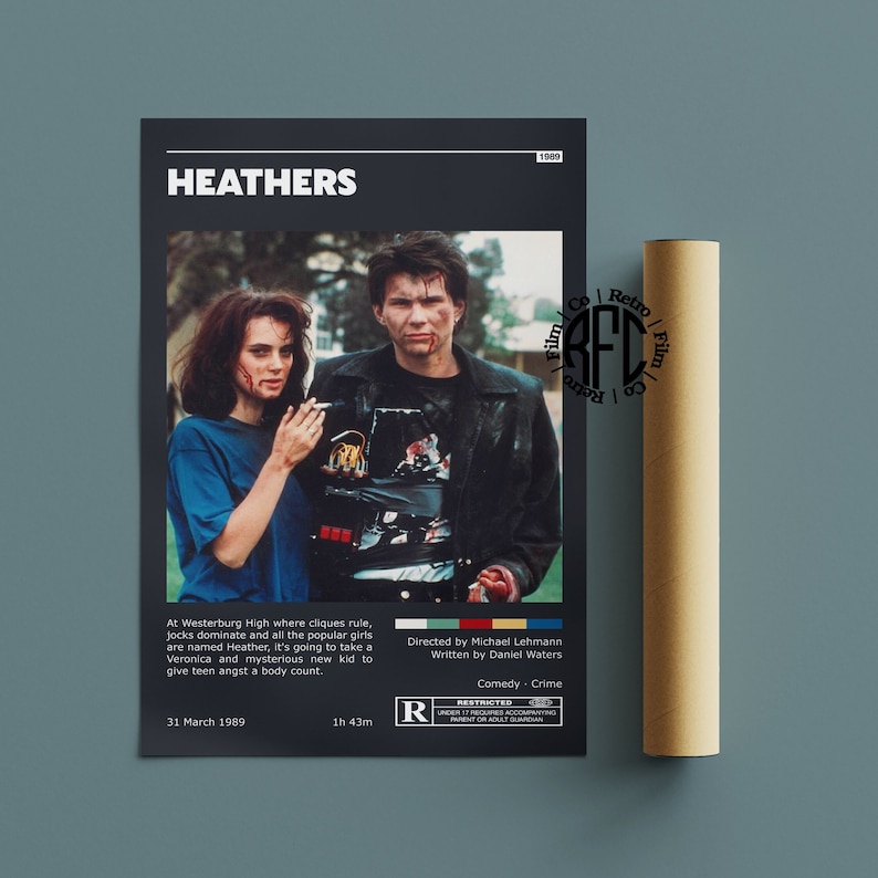 May include: A movie poster for the 1989 film "Heathers" featuring two teenagers, a girl with dark hair and a boy with light hair, standing in front of a green background. The poster includes the title of the film, the release date, the director and writer's names, and a rating of R.