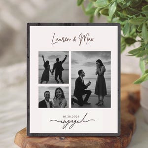 May include: A black and white photo collage on a wooden block, featuring four images of a couple. The top text reads "Lauren & Max" and the bottom text reads "engaged" with the date "10.28.2023".