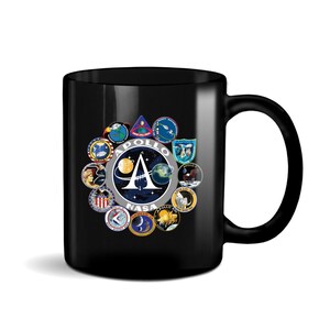 May include: Black ceramic coffee mug with a white NASA Apollo logo and a circle of colorful mission patches. The patches include the Apollo 11, 12, 13, 14, 15, 16, and 17 missions.