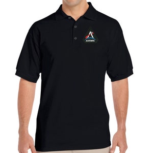 May include: A black polo shirt with a white and blue Artemis logo patch on the left chest.