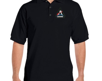 May include: A black polo shirt with a white and blue Artemis logo patch on the left chest.