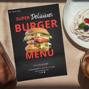 May include: A black burger menu with the text "SUPER Delicious BURGER MENU" and a photo of a burger. The menu includes a phone number and address for delivery. A dessert and a drink are also visible.