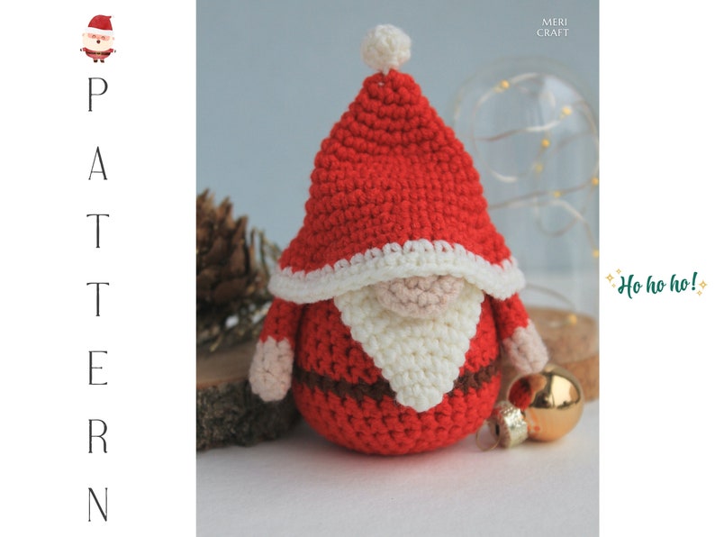 May include: Crocheted Santa Claus gnome ornament with a red hat, white beard, and brown belt. The gnome is sitting on a wooden surface with a gold ornament in the background. The text "Ho ho ho!" is written in green on a white background.