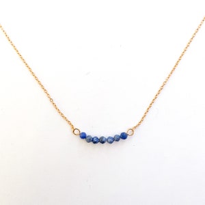 Sodalite necklace with blue natural stone on a gold stainless steel chain