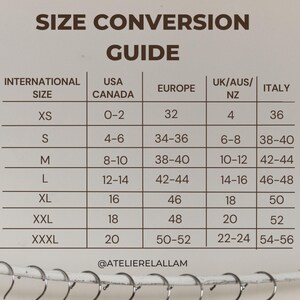 May include: A size conversion guide with the text "SIZE CONVERSION GUIDE" at the top. The chart compares international sizes to USA/Canada, Europe, UK/AUS/NZ, and Italy. Sizes range from XS to XXXL, with corresponding numerical values.