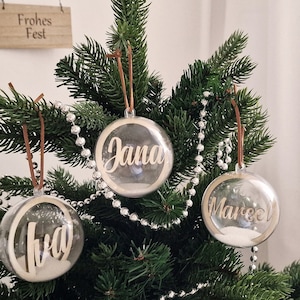 Personalized acrylic Christmas bauble with sand – unique decoration for your Christmas tree