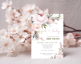 May include: A pink and white floral baby shower invitation with the text "oh baby" in pink script. The invitation includes the name Abby Wilson, the date and time of the shower, the location, and RSVP information. The invitation also includes the text "Registered at the Baby Stop & Pottery Barn Kids".