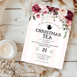 May include: A pink and white striped invitation with a floral border. The text reads "You are cordially invited to Christmas Tea at 1 o'clock in the afternoon. Join us for tea and Christmas cookies and the company of friends! Sat 21 Dec. The Hamilton Home 1234 Jingle Lane Evergreen, CO RSVP Liz 123.456.7890"