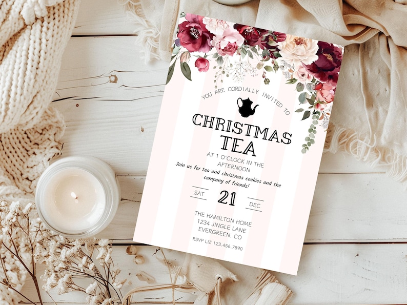 May include: A pink and white striped invitation with a floral border. The text reads "You are cordially invited to Christmas Tea at 1 o'clock in the afternoon. Join us for tea and Christmas cookies and the company of friends! Sat 21 Dec. The Hamilton Home 1234 Jingle Lane Evergreen, CO RSVP Liz 123.456.7890"