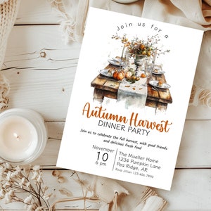 Autumn harvest dinner party invitation, with rustic table and pumpkins, and flowers