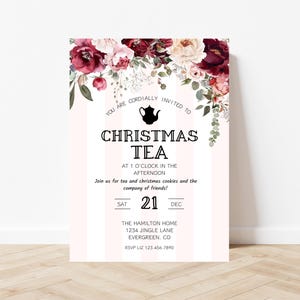May include: A white and pink striped invitation with a floral border. The invitation is for a Christmas tea party on Saturday, December 21st at 1 o'clock in the afternoon. The party will be held at The Hamilton Home, 1234 Jingle Lane, Evergreen, CO. RSVP to Liz at 123.456.7890.
