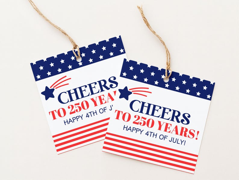 May include: Two square gift tags with a patriotic theme. Each tag has a blue border with white stars, red and white stripes, and the text "CHEERS TO 250 YEARS! HAPPY 4TH OF JULY!" in red and blue. They are tied with twine.