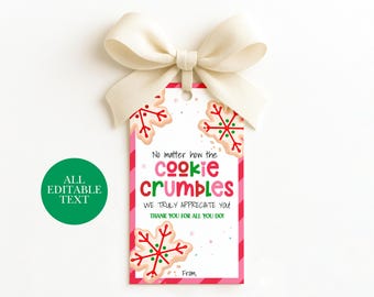 May include: A rectangular gift tag with a cream-colored ribbon bow at the top. The tag features snowflake-shaped cookies and the text: No matter how the cookie crumbles, we truly appreciate you! Thank you for all you do! From.