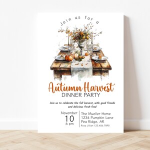 May include: An invitation to an Autumn Harvest Dinner Party. The invitation features a watercolor illustration of a rustic table setting with pumpkins, fall leaves, and a vase of flowers. The text reads "Join us for a Autumn Harvest Dinner Party" and includes the date, time, and location of the event.