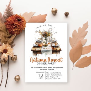 May include: An invitation to an Autumn Harvest Dinner Party. The invitation features a watercolor illustration of a rustic table setting with pumpkins, fall foliage, and a vase of flowers. The text reads "Join us for an Autumn Harvest Dinner Party" and includes the date, time, location, and RSVP information.