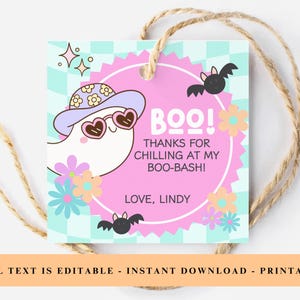 May include: A square Halloween-themed gift tag with a cartoon ghost wearing sunglasses and a hat. The tag has the word "BOO!" and the text "THANKS FOR CHILLING AT MY BOO-BASH! LOVE, LINDY." The background is light blue and pink with flowers and bats.