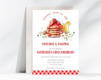 May include: A red and white checkered invitation for a first birthday party. The invitation features a watercolor illustration of a stack of pancakes with strawberries and syrup, a glass of orange juice, and white flowers. The text on the invitation reads "Please join us for Pancakes & Pajamas to celebrate Guinevere's First Birthday! Saturday, February 24th at 10am The Bradley Home 1234 S. Pancake Lane Pea Ridge, AR RSVP Katie 123.456.7890"