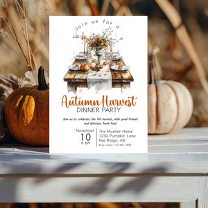 May include: An invitation to an Autumn Harvest Dinner Party. The invitation features a watercolor illustration of a rustic table setting with pumpkins, fall foliage, and a place setting. The text on the invitation reads "Join us for a Autumn Harvest Dinner Party" and includes the date, time, and location of the event.