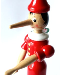 The Classic Pinocchio toy, doll, figurine with moving parts. Made in ITALY. Hand made and hand painted. 10 ht. Moving parts. Made of wood image 4
