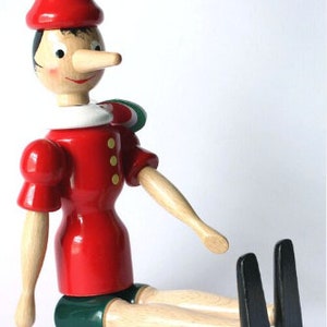 The Classic Pinocchio toy, doll, figurine with moving parts. Made in ITALY. Hand made and hand painted. 10 ht. Moving parts. Made of wood image 3