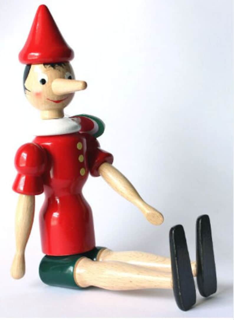 The Classic Pinocchio toy, doll, figurine with moving parts. Made in ITALY. Hand made and hand painted. 10 ht. Moving parts. Made of wood image 3