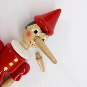 The Classic Pinocchio toy, doll, figurine with moving parts. Made in ITALY. Hand made and hand painted. 10 ht. Moving parts. Made of wood image 5
