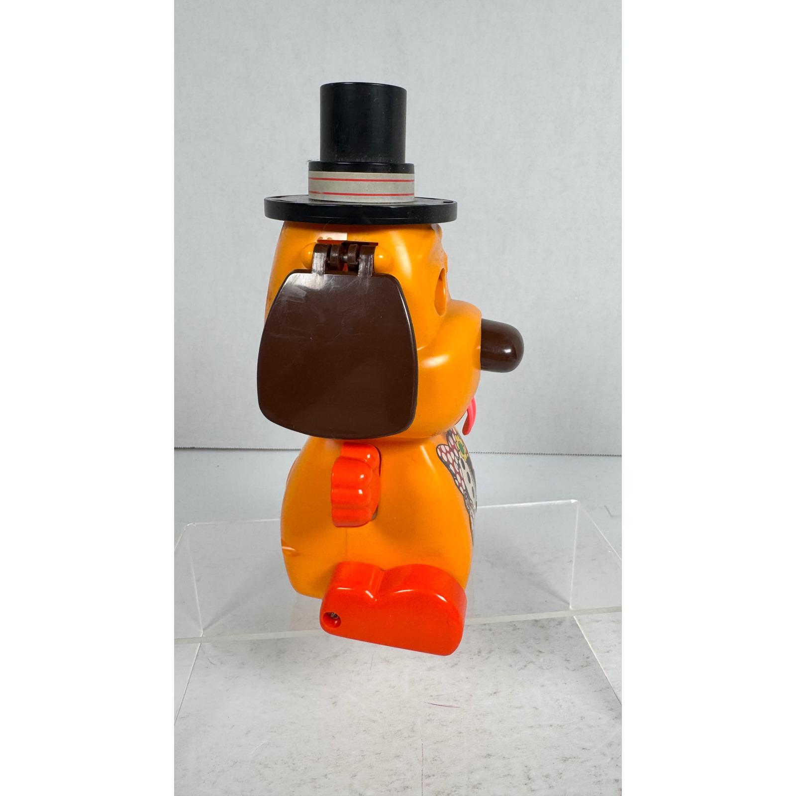 Tomy Doggone Dog Vintage 1970s Push Toy Clown Hat Rolling Dog