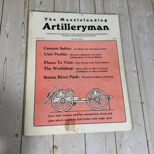 May include: A vintage magazine titled The Muzzleloading Artilleryman, Fall 1981, Vol. 3, No. 1. The cover features a salmon-colored rectangular box with black text listing articles and a line drawing of an 1861 caisson with ammunition chests.