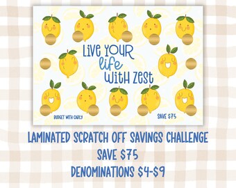 May include: A laminated scratch-off savings challenge card with a lemon theme. The card features a yellow lemon design with a gold scratch-off area. The text on the card reads "Live your life with zest" and "Save $75".