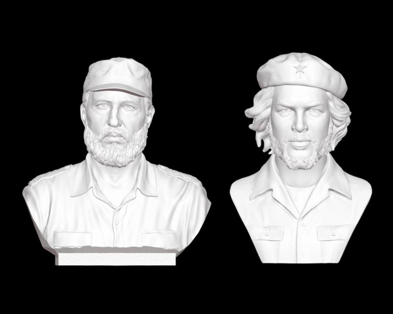 May include: Two white plaster busts of famous Cuban revolutionaries. The bust on the left is of Fidel Castro, wearing a cap. The bust on the right is of Che Guevara, wearing a beret with a star.