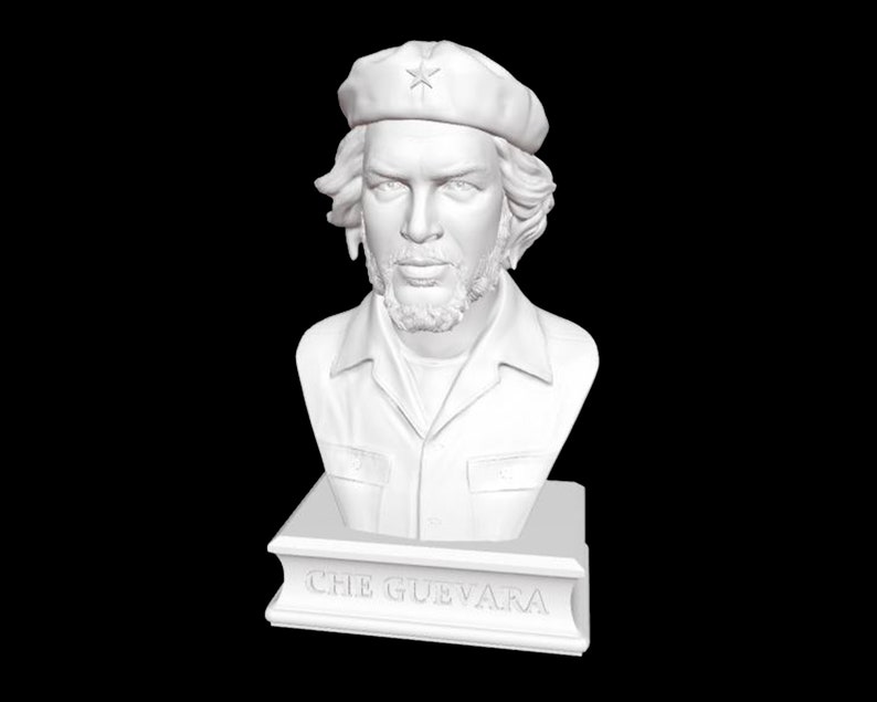 May include: White bust sculpture of Che Guevara wearing a beret with a star on it. The bust is on a white base with the words "CHE GUEVARA" inscribed on it.