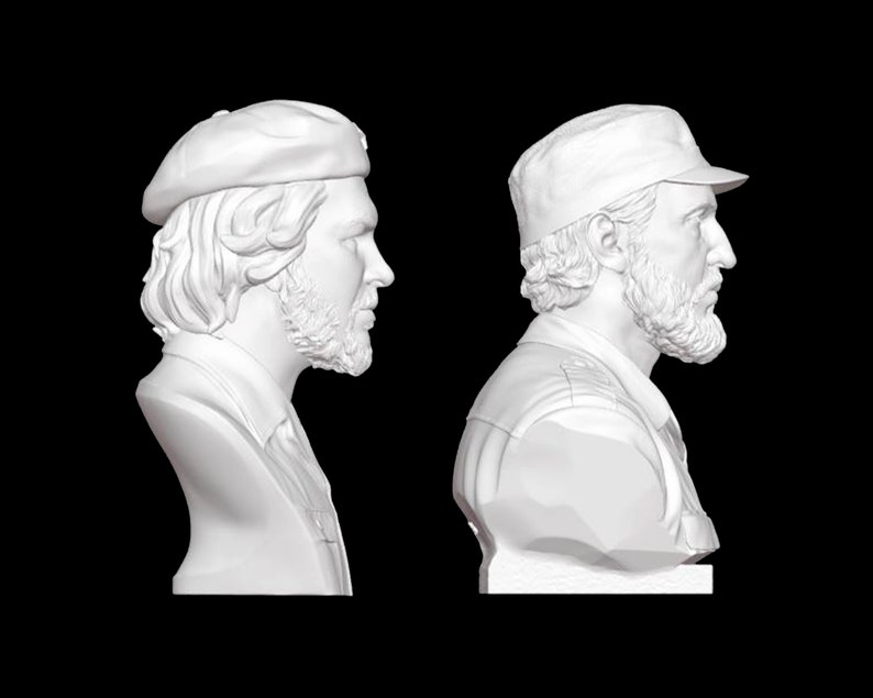 May include: White plaster bust sculpture of a man with a beard wearing a beret and a cap. The bust is shown from two different angles.